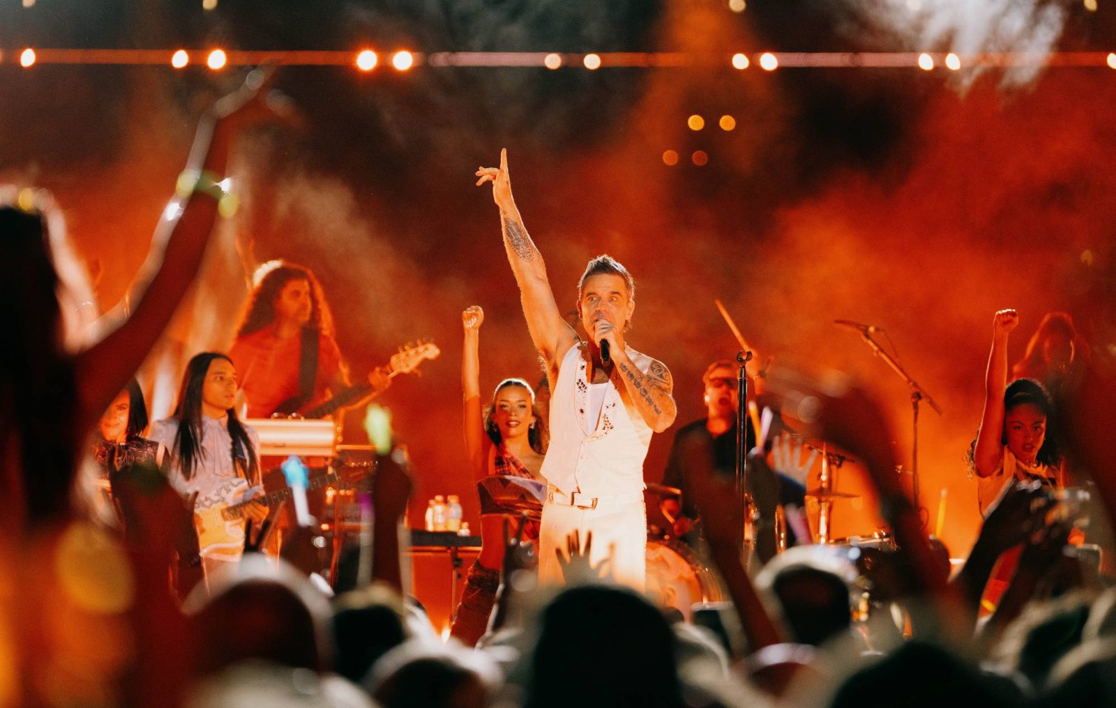 Robbie Williams perfoms at ABCs New Years Eve Party in Sydney Australia. Credit Leo Baron