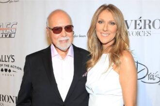 Celine Dion and Rene Angelil posing